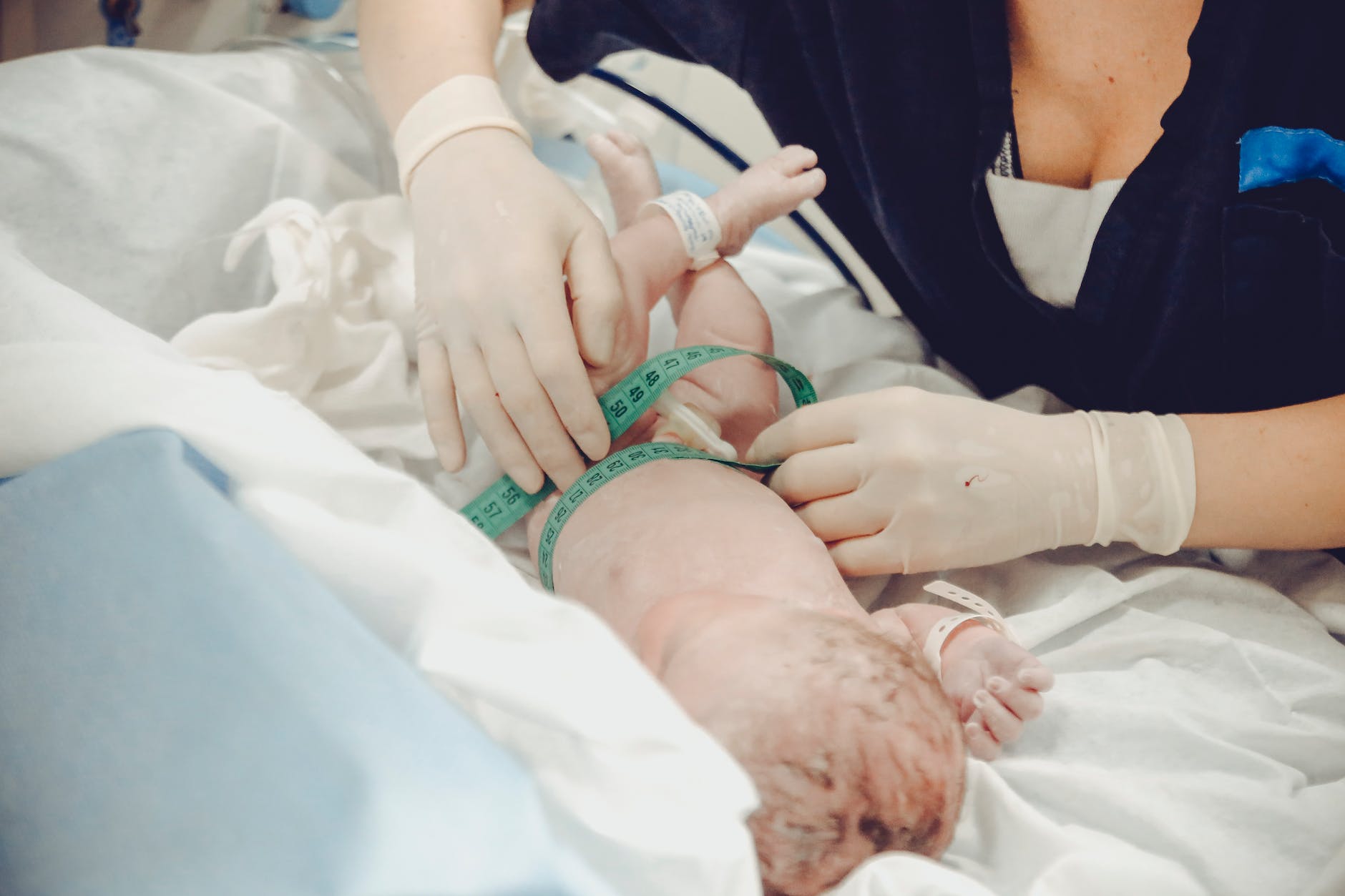 measuring newborn baby for Integrative Pediatric Health Care